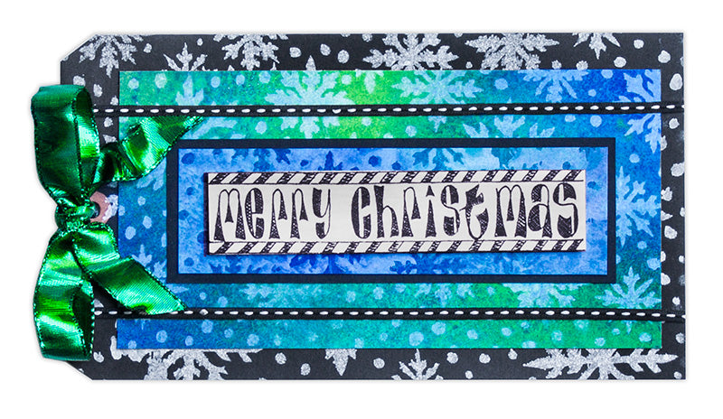 Dylusions Merry Christmas Tag by Debbie Tlach
